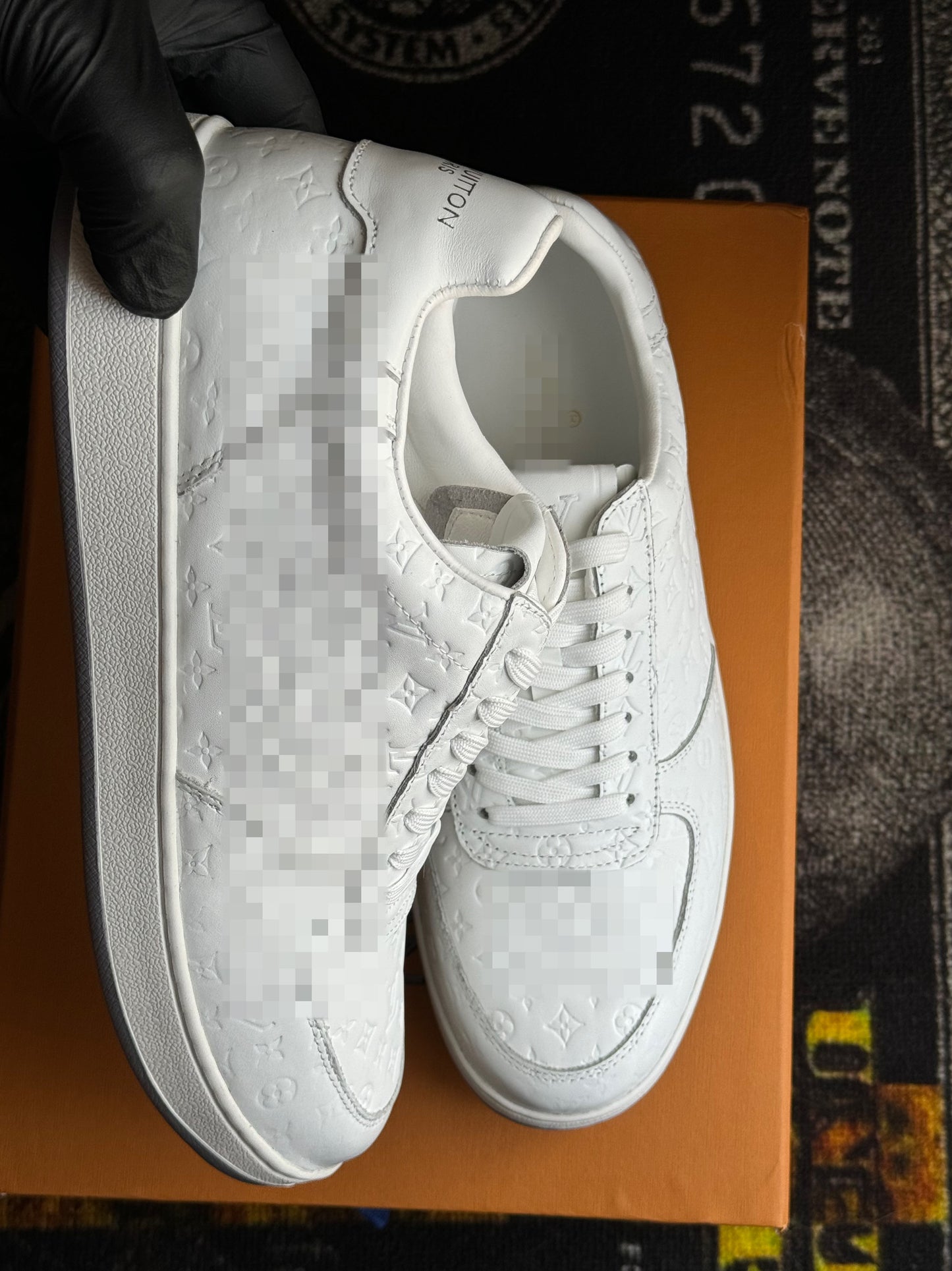 White embossed Louie